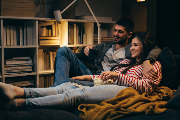 istock couple enjoying evening at home 1356717419