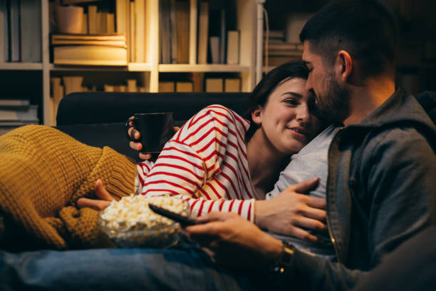 istock couple enjoying evening at home 1356717434