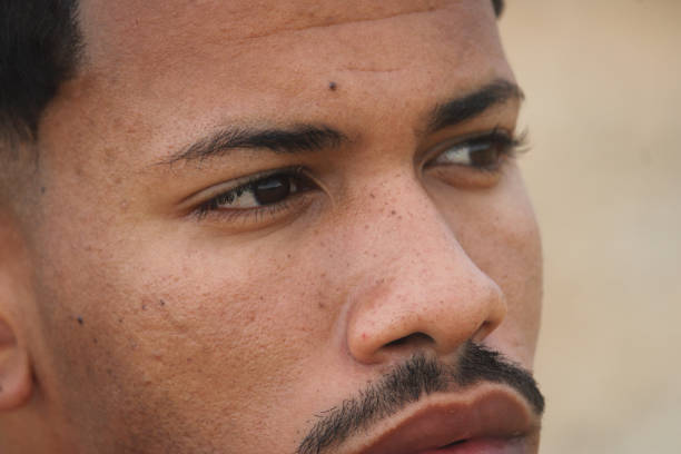 istock Close up of a pensive afro young man 1356719617
