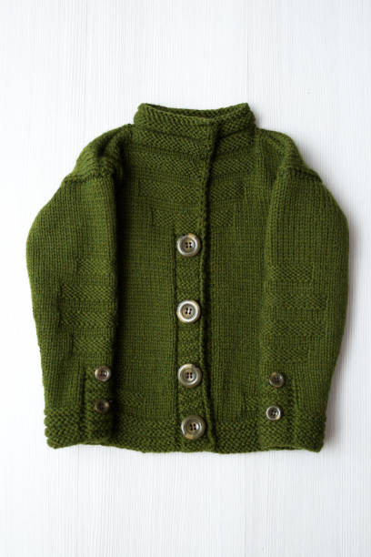istock Knitted children's sweater on a white background 1356720155