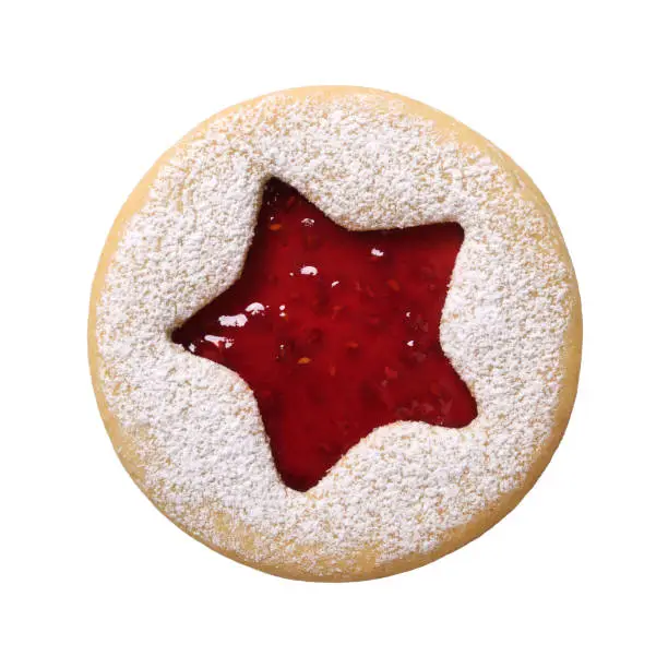 Traditional Christmas Linzer Cookie with raspberry jam isolated on white background. Homemad cookies close up.