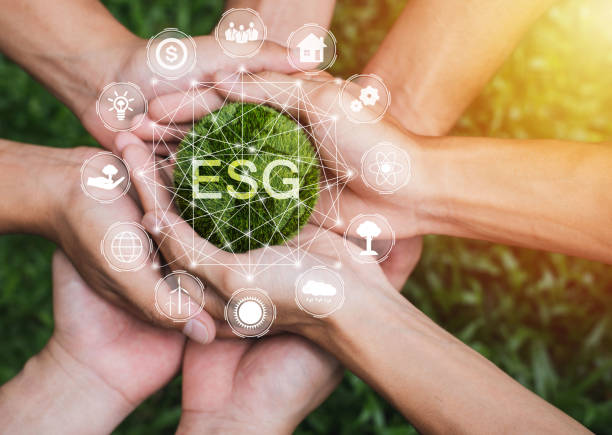 istock Hands adult Teamwork harmony Holding earth on hands with ESG icon concept for environmental, social, and governance in sustainable and ethical business on the Network connection 1356723953