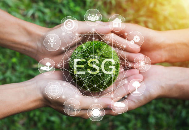istock Hands adult Teamwork harmony Holding earth on hands with ESG icon concept for environmental, social, and governance in sustainable and ethical business on the Network connection 1356723961