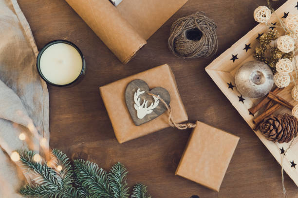 istock new year or christmas celebration , presents packaging top view 1356726277