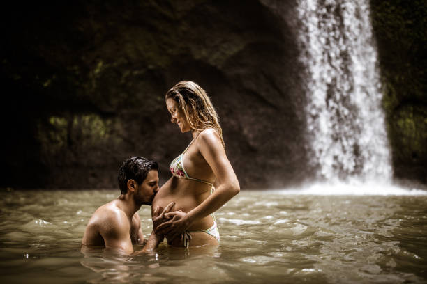 istock Kiss for my expecting child! 1356726645