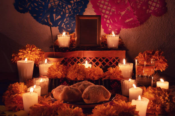 Mexican Day of the Dead Altar with cempasuchil flowers Traditional mexican Day of the Dead Altar with cempasuchil flowers altar stock pictures, royalty-free photos & images