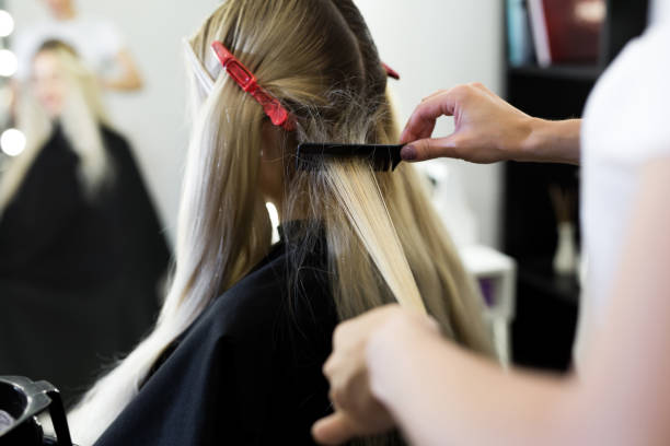 istock Process of dyeing hair at beauty salon 1356729355