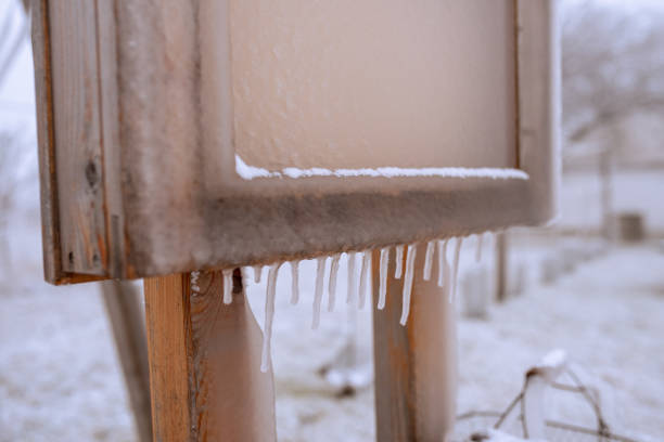 istock Icicles on a wooden board in winter 1356730208