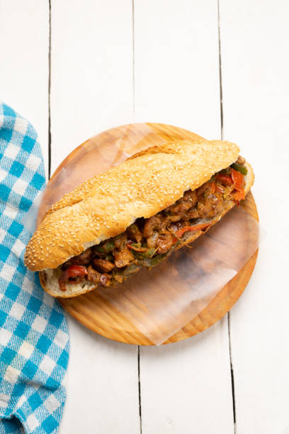 istock Philly cheese steak with bell pepper on white background 1356730230