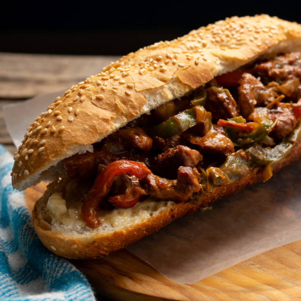 istock Philly cheese steak with bell pepper on wooden background 1356730474