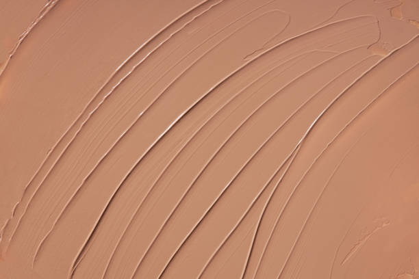 istock Liquid foundation smear texture for dark skin tones 1356731027