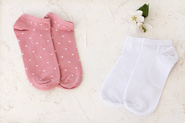 istock Two pair of women socks on white background. 1356734464