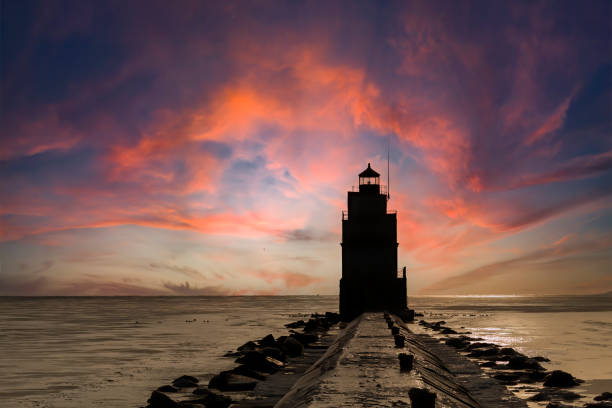 istock Lighthouse on Lake Michigan before sun rise. 1356741017