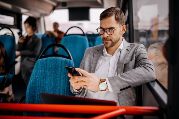 istock Young well dressed man on the way to work 1356741297
