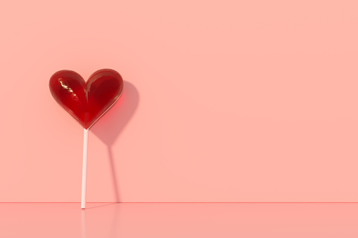 3D Rendering of Valentine's Day, heart shape lollipop on pink background.