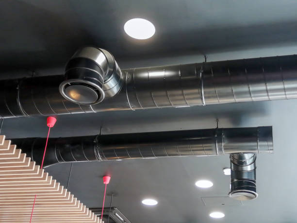 istock The ventilation duct is black on the ceiling in the room. 1356742684