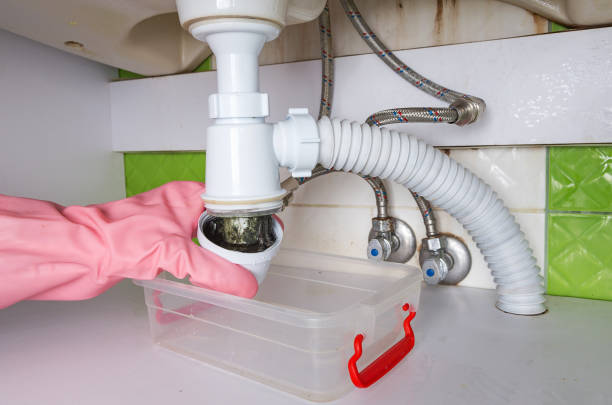 istock Cleaning the clogged bathroom drain. 1356746950
