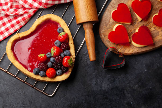 istock Heart shaped sweet cake with berries 1356747015
