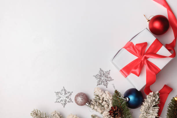 istock Christmas or New Year background, plain composition made of decorations and fir branches, flat lay, blank space for text 1356747625