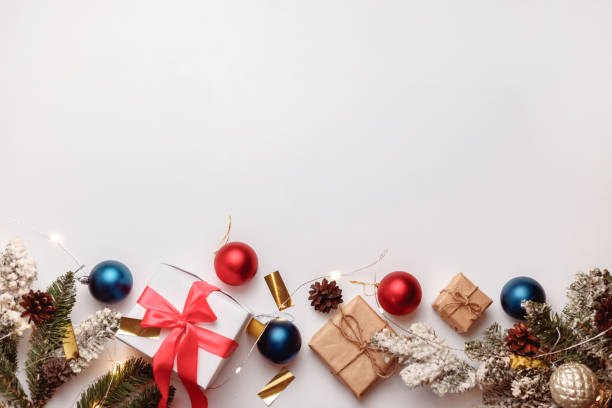 istock Christmas or New Year background, plain composition made of decorations and fir branches, flat lay, blank space for text 1356747626