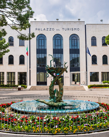 The Palazzo del Turismo (Tourism Palace) was built in 1938 to promote the tourism on the Adriatic coast, and today is the seat of the Municipality offices and tourist services. In front of it stands the fountain Fontana del Nuotatore, created in 1958.