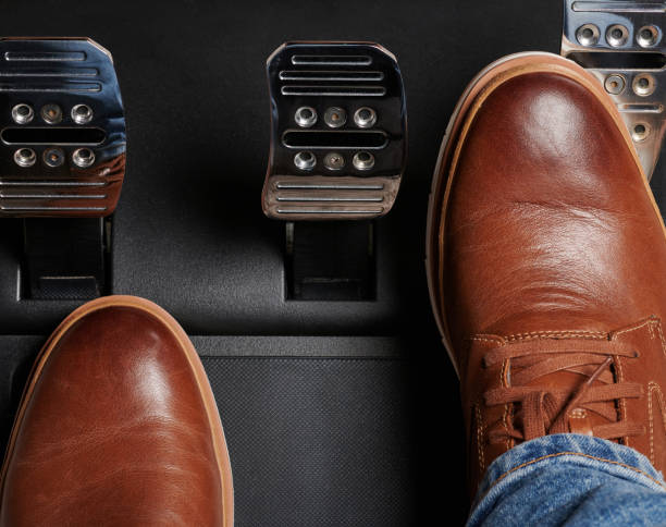 istock Press throttle pedal in car 1356749999