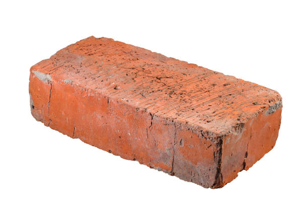 istock red brick one standard regular size isolated on white background. full depth focus 1356754222