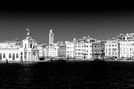 Artistic Black and White reinterpretation of a classical landscape in Venice, Punta della Dogana. View from Giudecca channel.