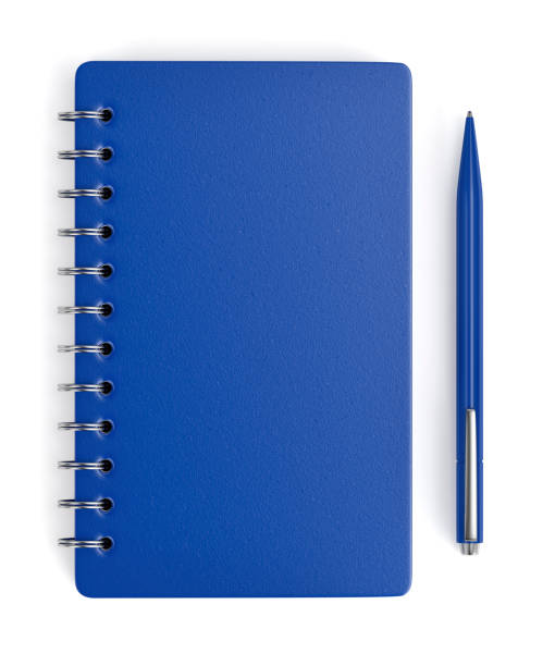 Blue spiral notebook and pen stock photo