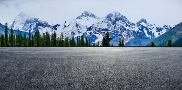 istock Road and mountain nature background 1356755416