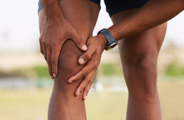 istock Shot of a man experiencing a knee cramp during a workout routine 1356757441
