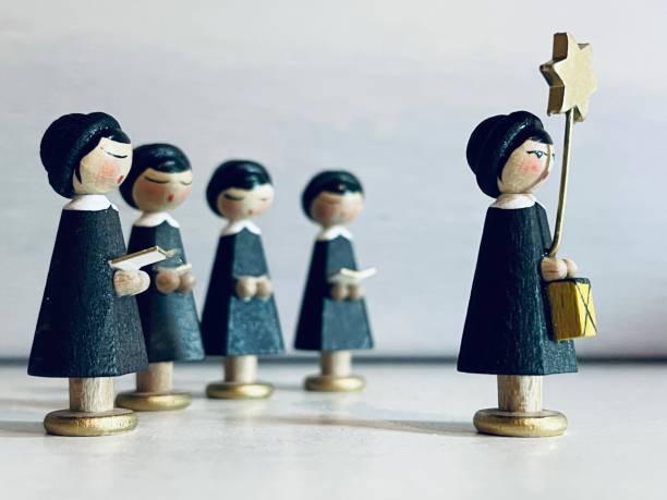 istock Carolers, small wooden figurines 1356758084