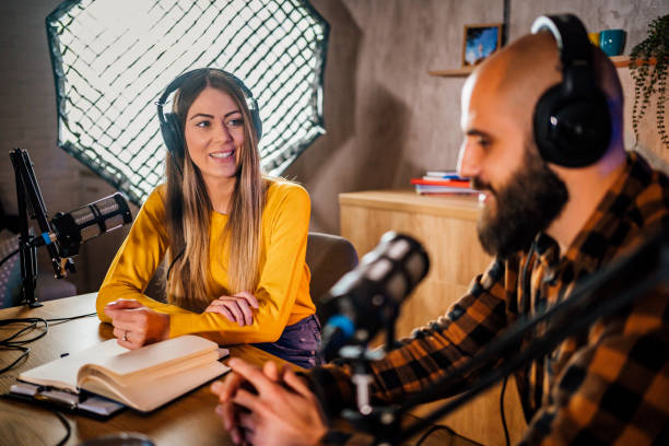 istock Woman interviewing a guest 1356759045