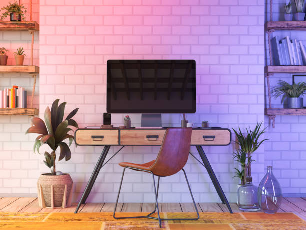 Cozy Workspace with Neon Lights stock photo