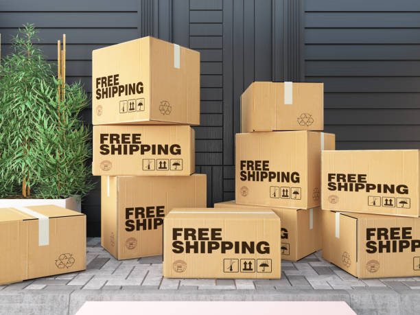 istock Free Shipping Cargo Boxes on Doorway 1356761468