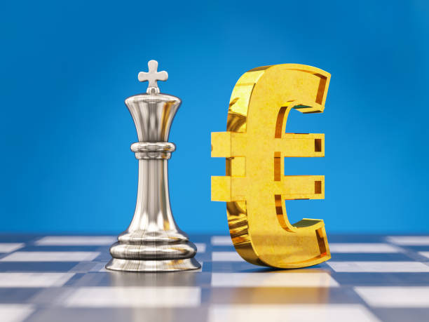 istock Euro Sign with King Chess Piece on Chess Board 1356761884