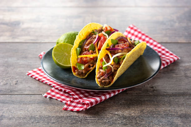 istock Traditional Mexican tacos with meat and vegetables 1356766015