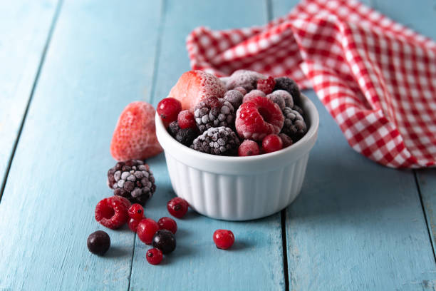 istock Assortment of iced berries in a bowl 1356766118