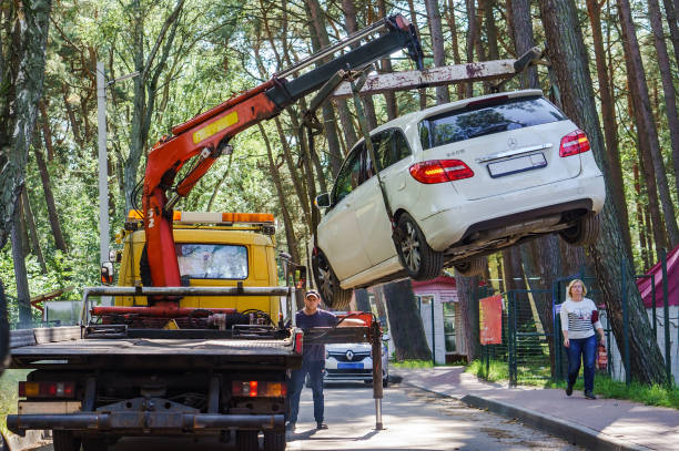 Evacuating a car from a city street. Penalty and evacuation for improper parking. Violation of the traffic rules. stock photo