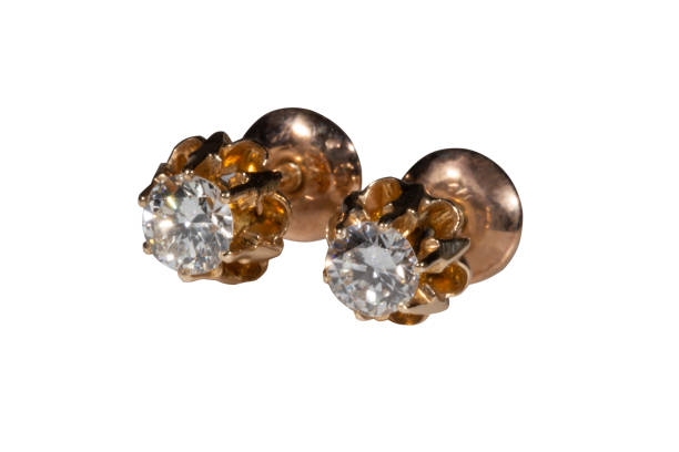 istock Rose Gold Diamond Solitaire Earrings isolated on a white 1356769504