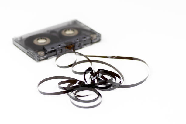 istock Old audio cassette with loose tape 1356769610