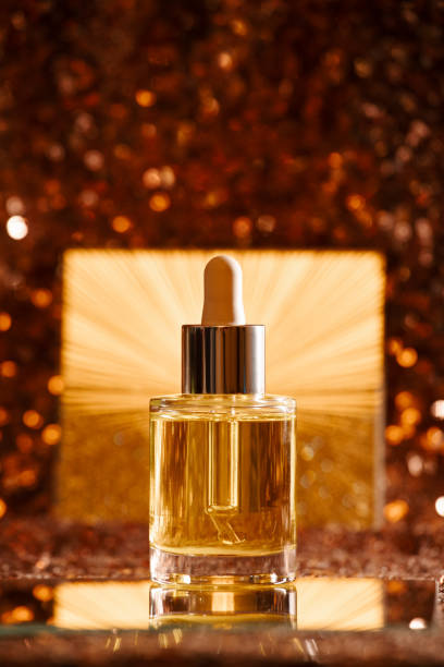 istock face oil on sequin dress with gold starburst backdrop 1356770963
