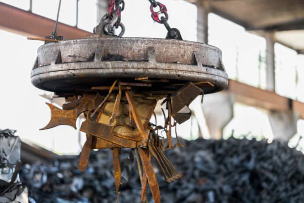 istock Scrap magnet carrying scrap metal 1356772426