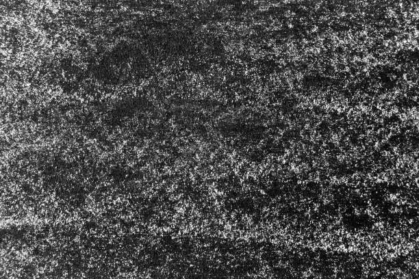 istock Grunge white color chalk texture on blackboard or chalkboard background with copy space 1356776410