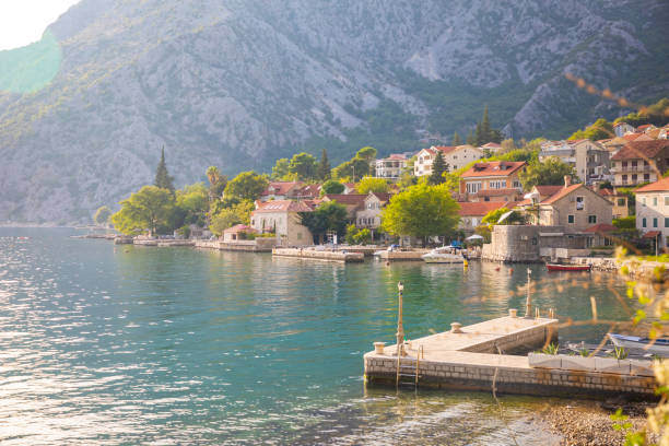 istock Fishing village on mountain background in Montenegro 1356776696