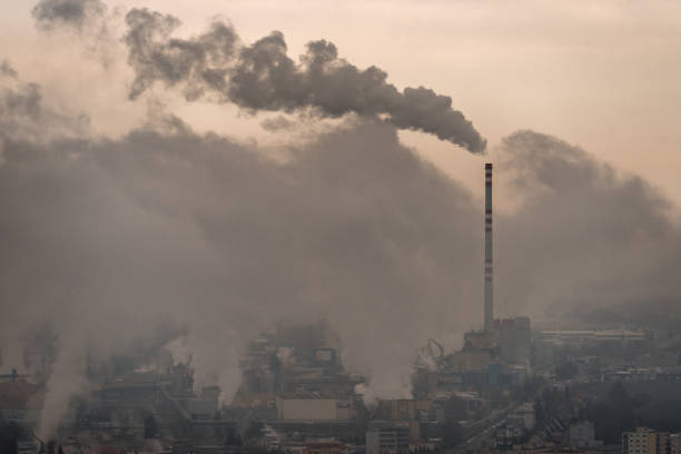 istock Smoke from chimny in factory. Air pollution concept 1356778237
