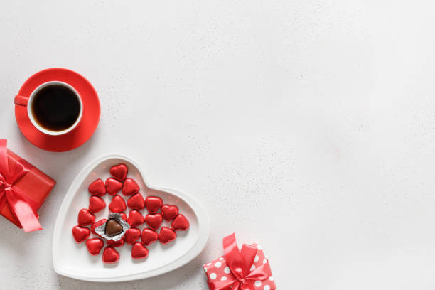 istock Red hearts chocolate sweets, red roses for Valentine's day. 1356779199