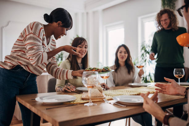 istock Group of friends on dinner party 1356779913