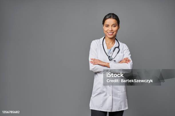 Successful Female Doctor Isolated On Grey Background Stock Photo - Download Image Now