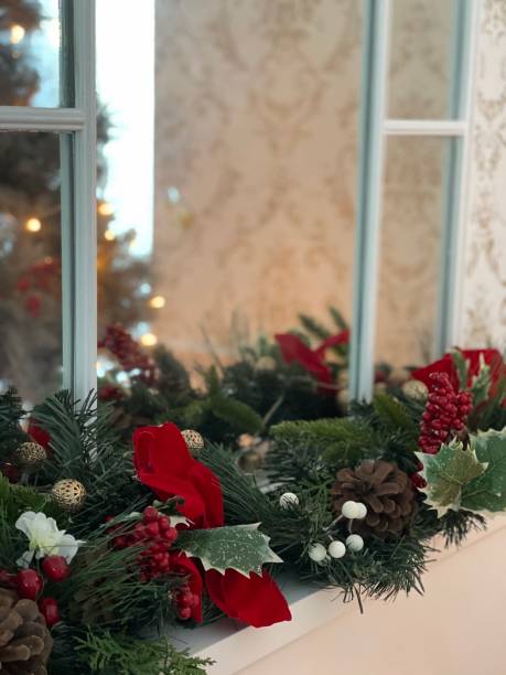 istock Christmas decoration on a fireplace 1356787865